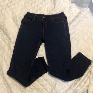 Miss poured in blue dark wash jeans